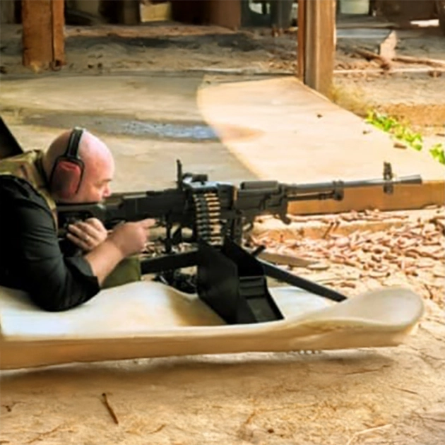 Belt-fed 7.62mm full-auto machine gun with tripod