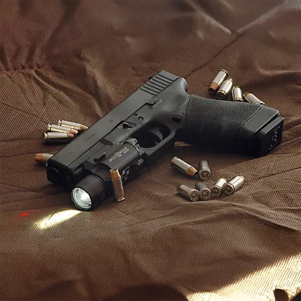 Glock 22C top view featuring dual compensator ports on slide and barrel