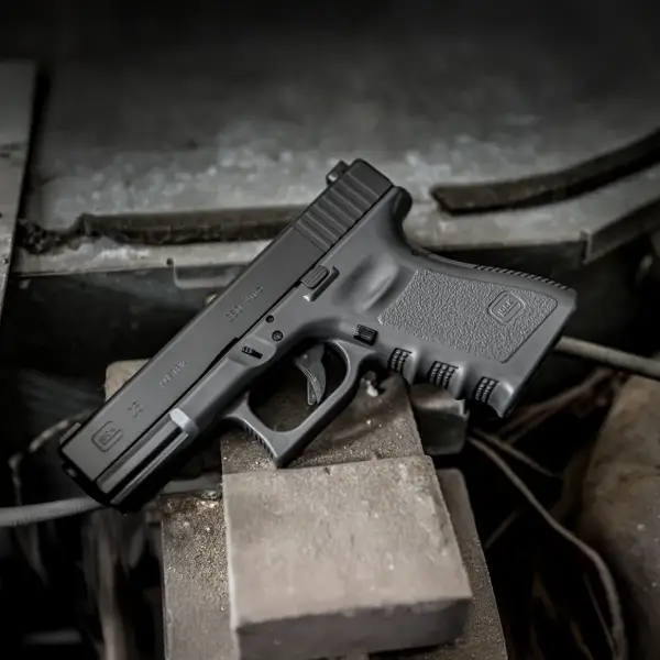 Rear top view Glock 25 highlighting combat rear sight and stippled backstrap
