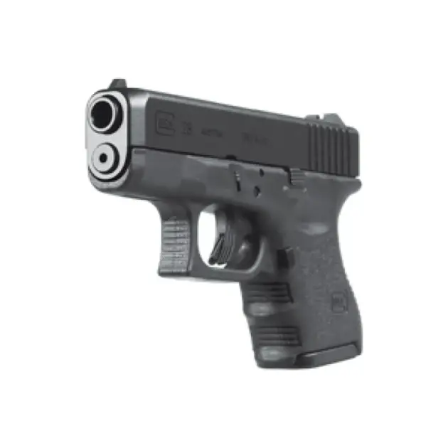 Outdoor shot: Glock 28 with ten-round magazine on weathered timber