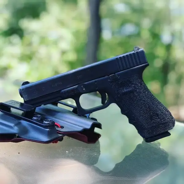 Rear top view of Glock 31 showing adjustable rear sight and textured backstrap