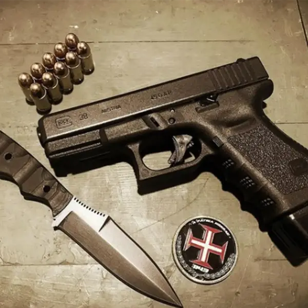 Rear top view Glock 38 highlighting combat rear sight and textured backstrap