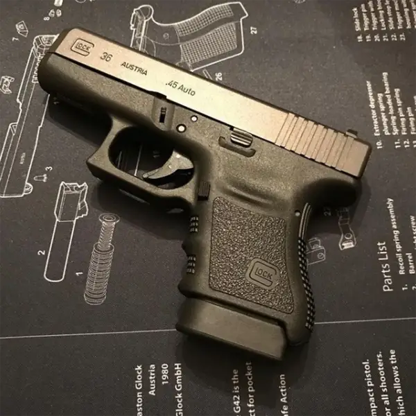 Left-side profile Glock 36 with “.45 Auto” engraving and forward serrations