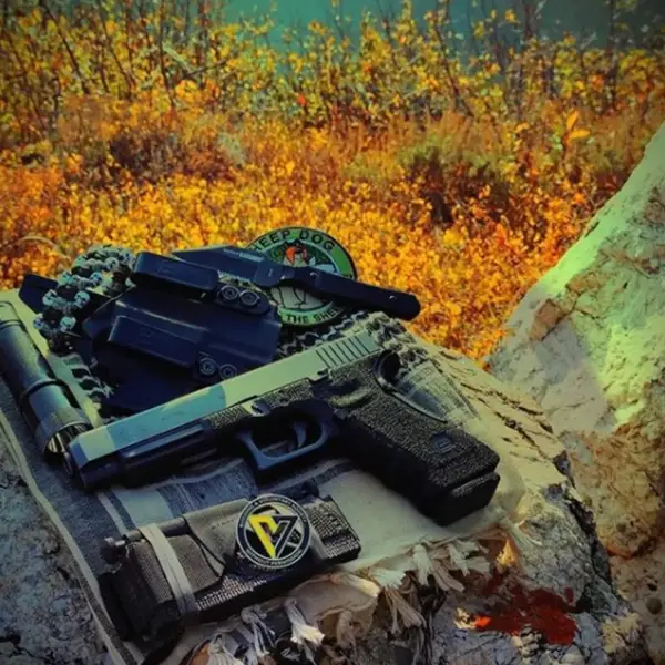 Rear top view Glock 35 highlighting adjustable rear sight and textured backstrap