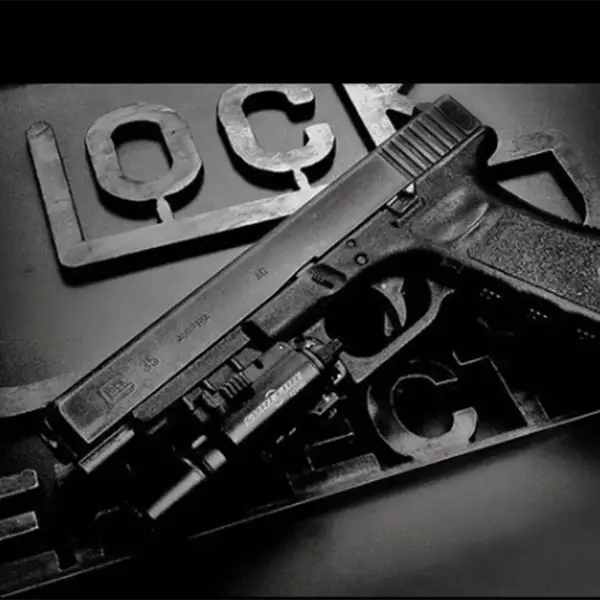 Outdoor shot: Glock 35 on bench with chronograph and .40 S&W ammo boxes