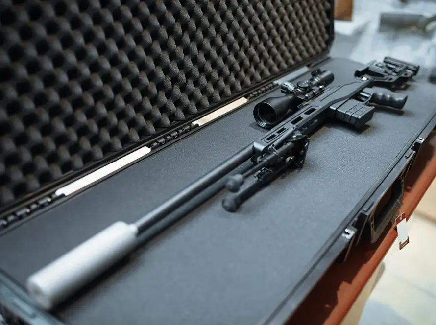 14.5 mm Ammunition Logistics hard-case with secured anti-materiel sniper rifle, shock-isolated foam.
