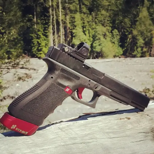 Rear top view Glock 24 highlighting adjustable rear sight and stippled backstrap