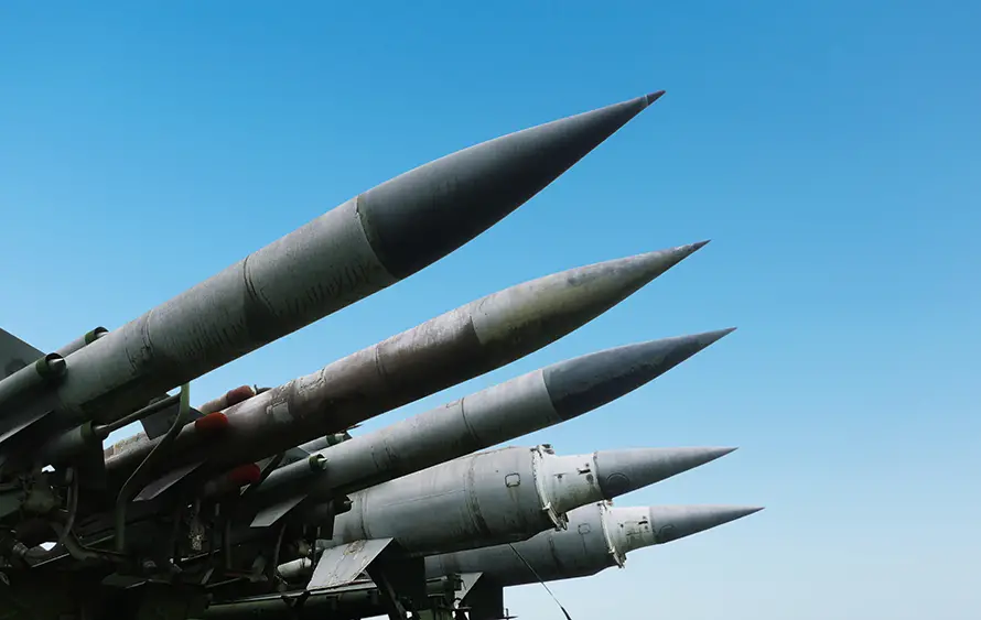 Surface-to-air missiles on a launcher; air defense system with MRAD/LRAD concept.